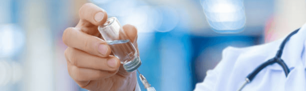 left-4 Healthcare Worker With Needle Preparing for Ultrasound Guided Regional Anesthesia